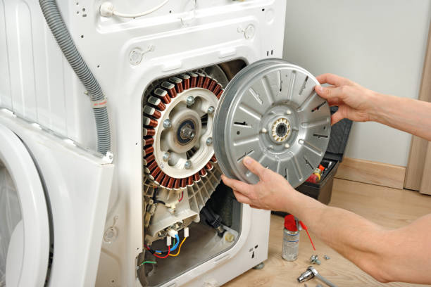 Technician repairing appliance